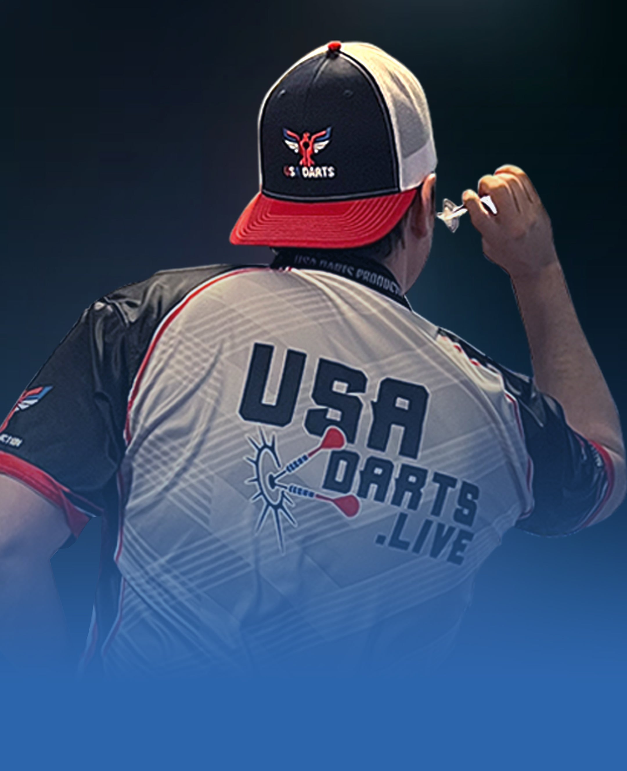 USA Darts richardson 112 trucker style hat worn backwards by a darts player.